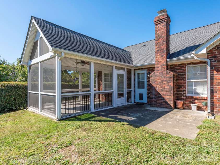 8415 Quail Hollow Drive, Harrisburg, NC 28075.  MLS# CAR4424111, YatesRealty ID 54022. Screen porch
