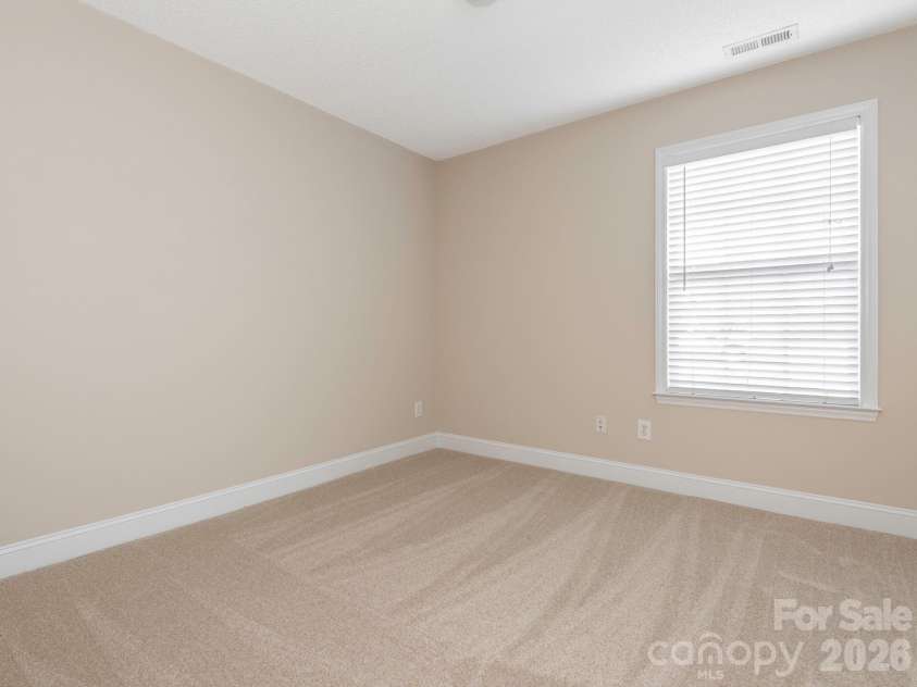 8415 Quail Hollow Drive, Harrisburg, NC 28075.  MLS# CAR4424111, YatesRealty ID 54022. Secondary bedrooms are both ample sized