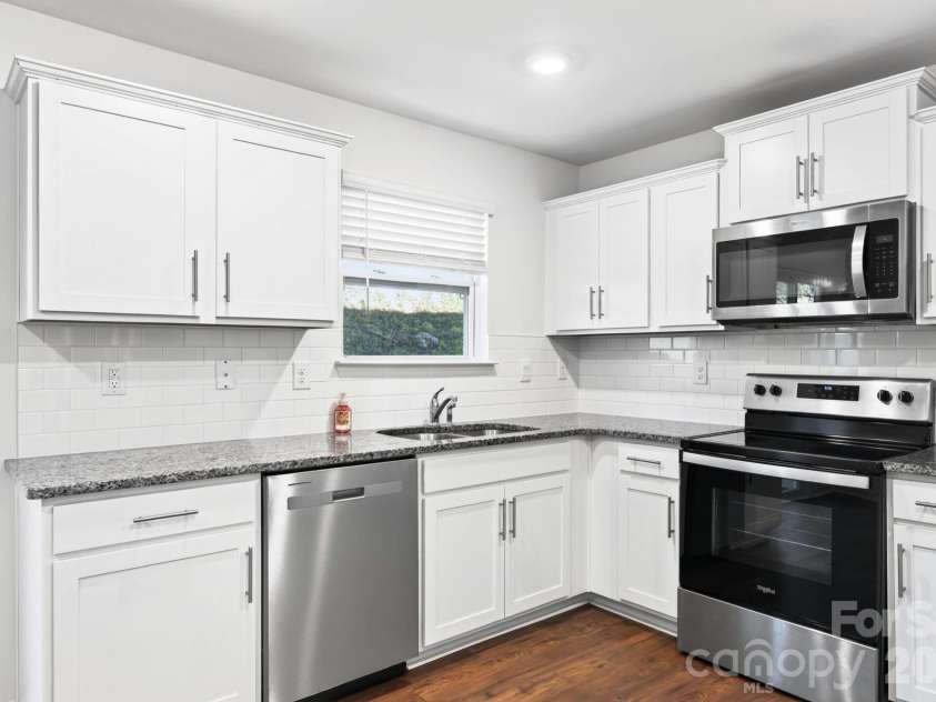 15 Virginia Commons Drive, Arden, NC 28704.  MLS# CAR4429383, YatesRealty ID 54035. Ample Kitchen Workspace and Storage