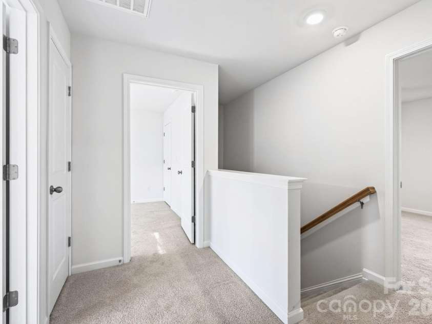 15 Virginia Commons Drive, Arden, NC 28704.  MLS# CAR4429383, YatesRealty ID 54035. Upper Level Landing