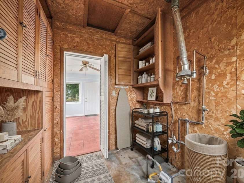 3029 Rosehill Drive, Charlotte, NC 28212.  MLS# CAR4417445, YatesRealty ID 54036. Laudry area VIRTUAL Staging only