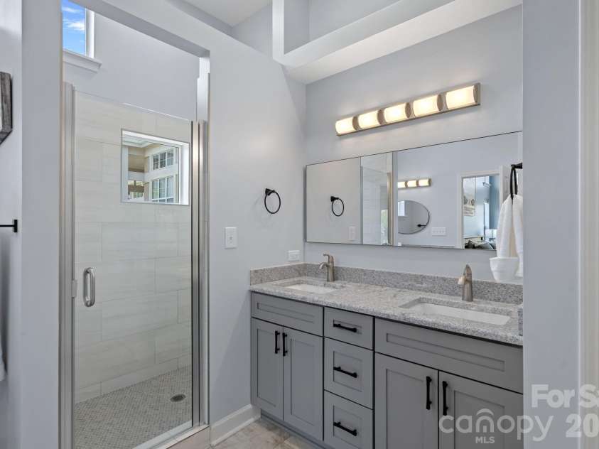 103 Pier 33 Drive, Mooresville, NC 28117.  MLS# CAR4403994, YatesRealty ID 54037. Updated Primary Bathroom