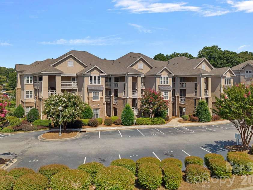 103 Pier 33 Drive, Mooresville, NC 28117.  MLS# CAR4403994, YatesRealty ID 54037. View of Condo units from front