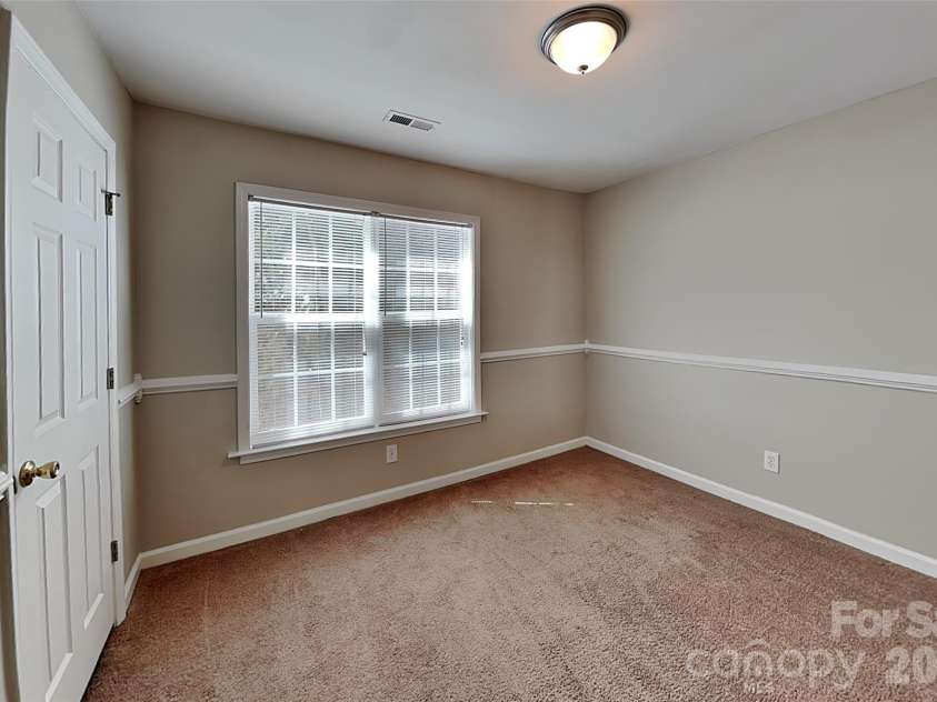 128 Julia Street, Mount Holly, NC 28120.  MLS# CAR4430176, YatesRealty ID 54039. 