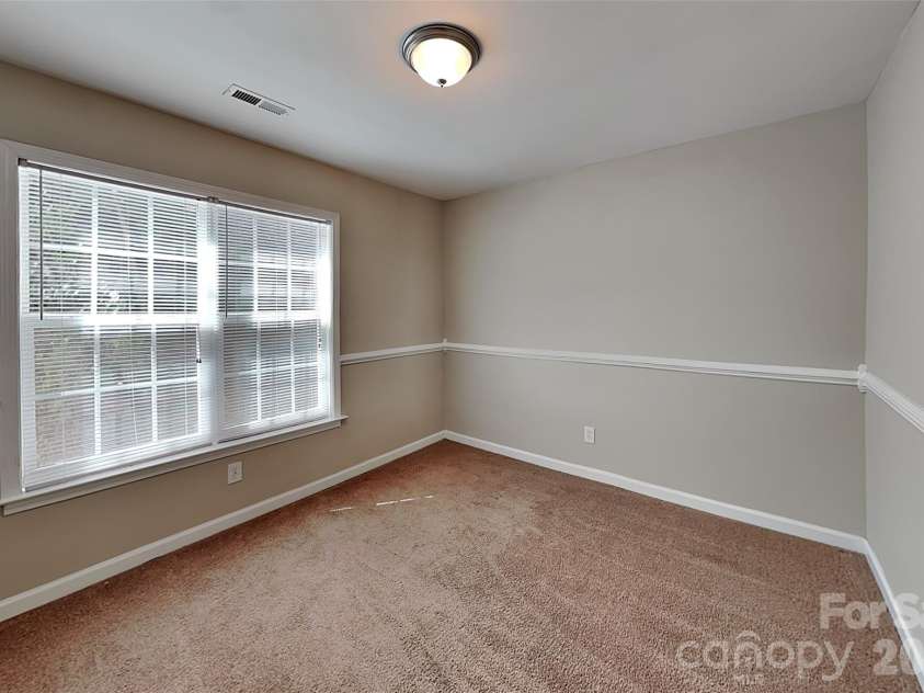 128 Julia Street, Mount Holly, NC 28120.  MLS# CAR4430176, YatesRealty ID 54039. 