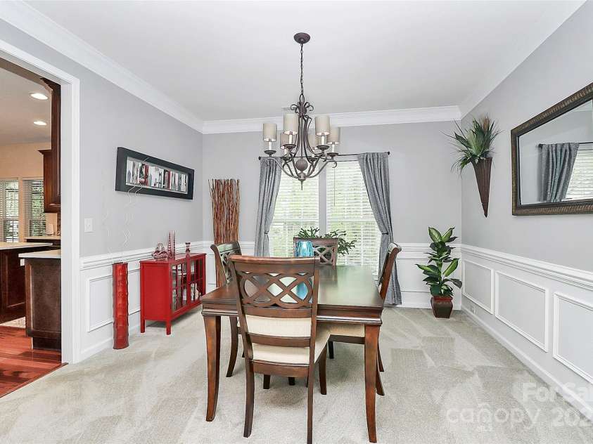 4086 Buckingham Drive, Fort Mill, SC 29707.  MLS# CAR4243764, YatesRealty ID 5404. 2nd view of the formal dining room with wainscoting details