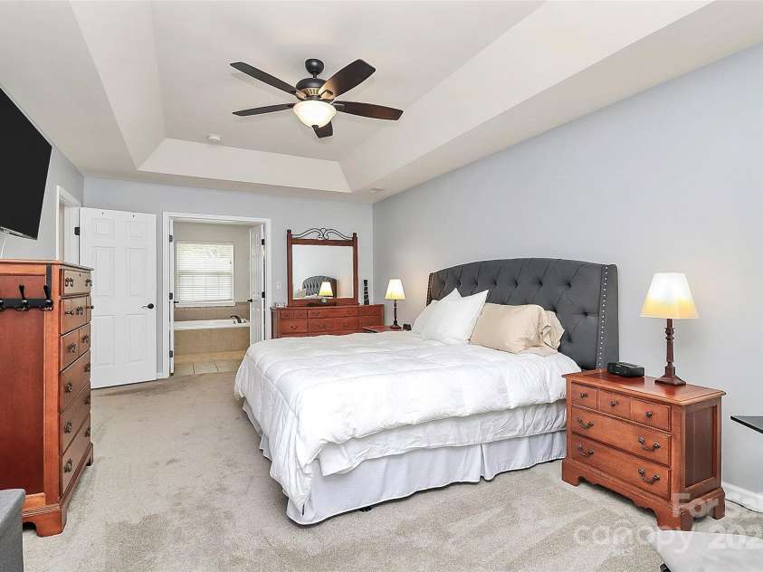 4086 Buckingham Drive, Fort Mill, SC 29707.  MLS# CAR4243764, YatesRealty ID 5404. 2nd view of the primary bedroom with a double door entrance into the attached bath