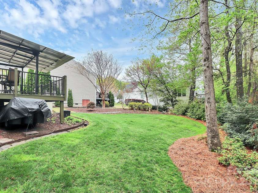 4086 Buckingham Drive, Fort Mill, SC 29707.  MLS# CAR4243764, YatesRealty ID 5404. Private backyard with mature landscaping
