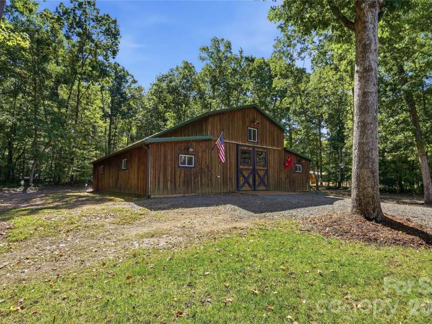 317 Windmill Lane, Waxhaw, NC 28173.  MLS# CAR4429362, YatesRealty ID 54041. Pole Barn ready for every hobby you have