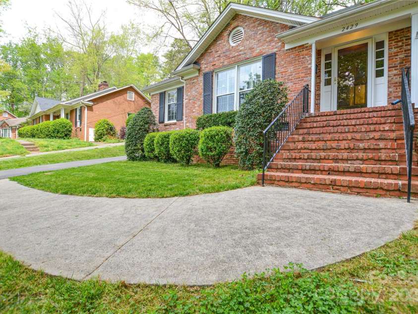 2429 Sugar Mill Road, Charlotte, NC 28210.  MLS# CAR4245721, YatesRealty ID 5405. Walkway leading to the front steps and porch.