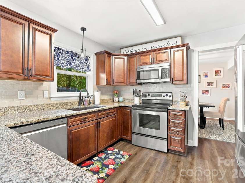 603 Winter Wood Drive, Matthews, NC 28105.  MLS# CAR4430174, YatesRealty ID 54050. 