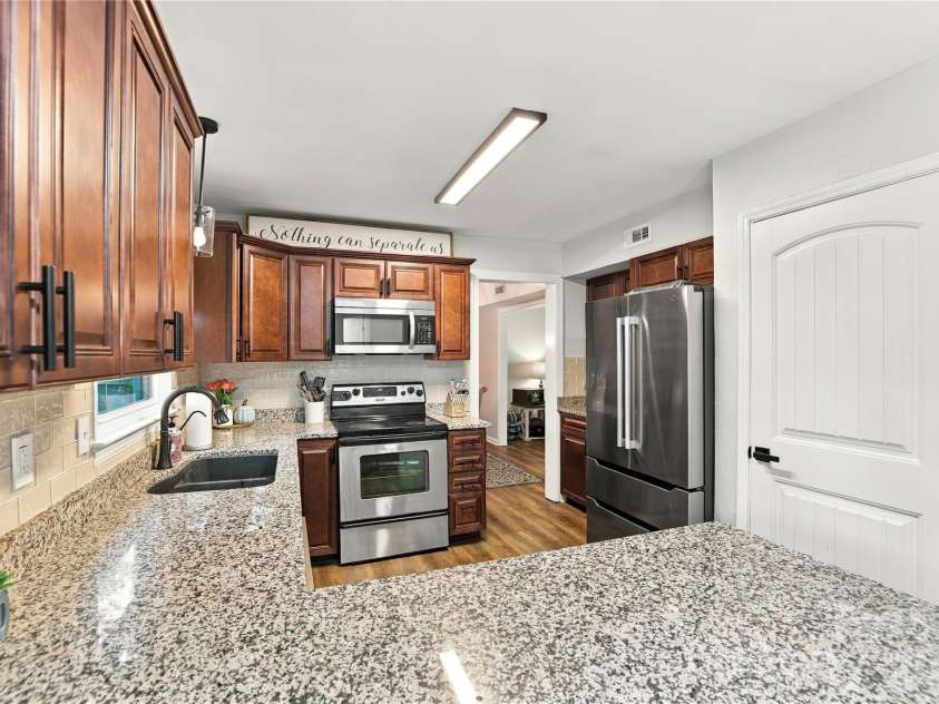 603 Winter Wood Drive, Matthews, NC 28105.  MLS# CAR4430174, YatesRealty ID 54050. 