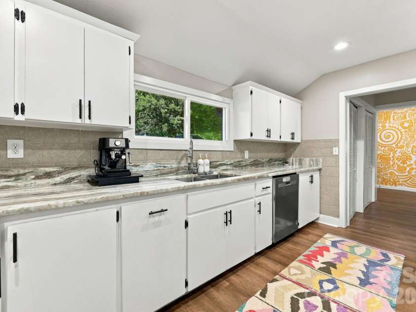 16 Warren Creek Road, Candler, NC 28715.  MLS# CAR4427483, YatesRealty ID 54052. 