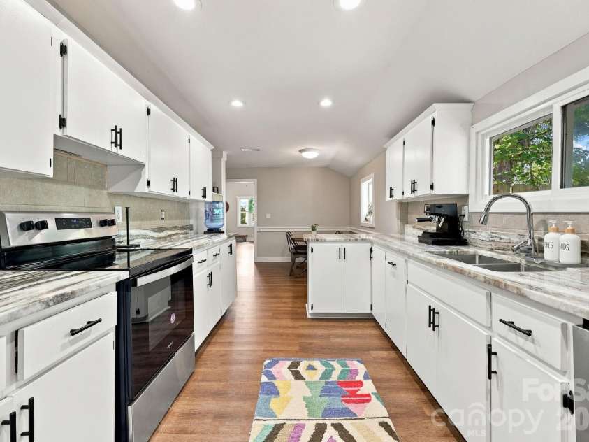 16 Warren Creek Road, Candler, NC 28715.  MLS# CAR4427483, YatesRealty ID 54052. 