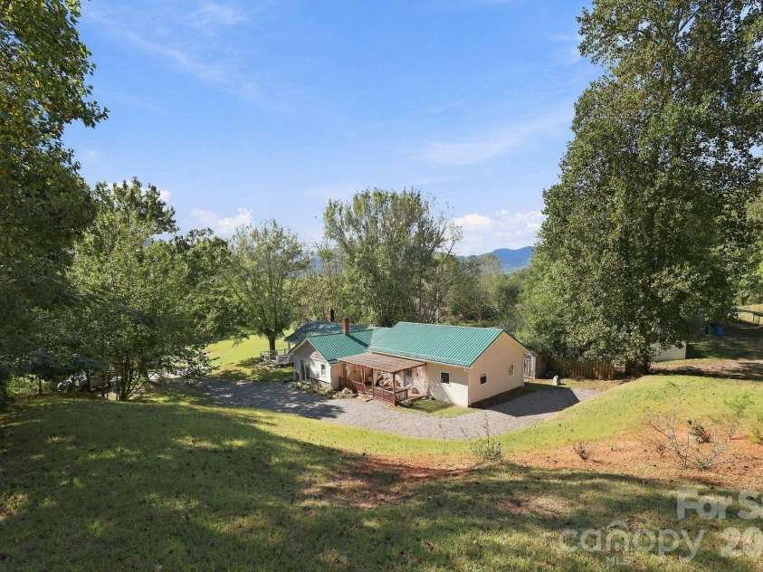 16 Warren Creek Road, Candler, NC 28715.  MLS# CAR4427483, YatesRealty ID 54052. 