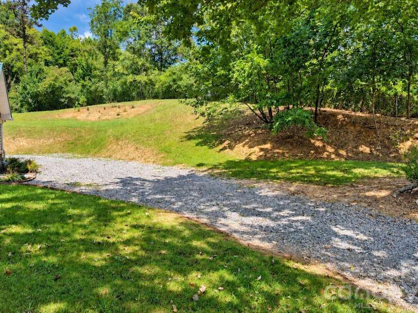 16 Warren Creek Road, Candler, NC 28715.  MLS# CAR4427483, YatesRealty ID 54052. 