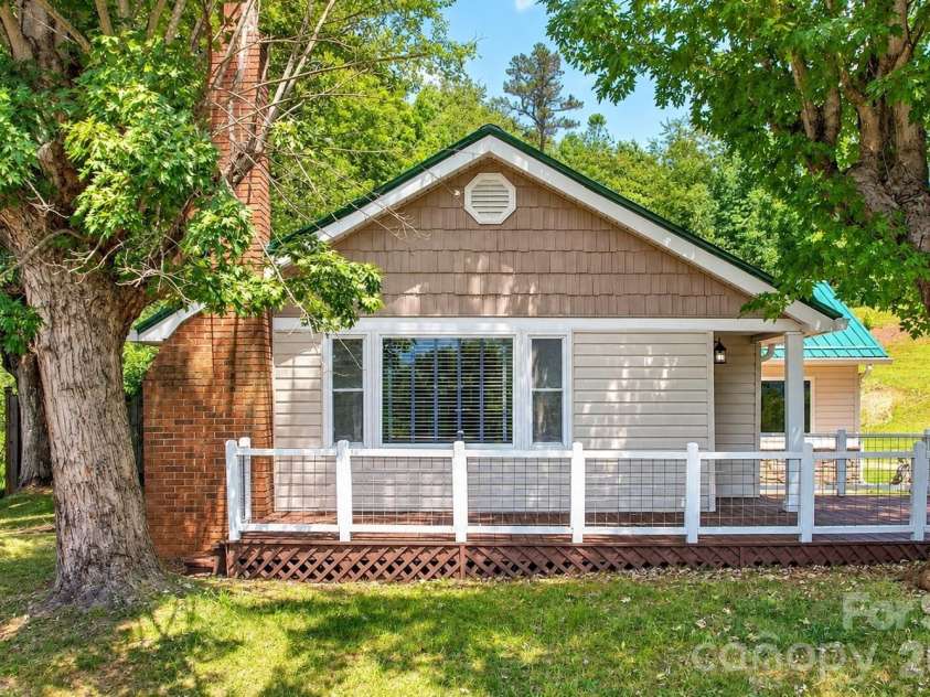 16 Warren Creek Road, Candler, NC 28715.  MLS# CAR4427483, YatesRealty ID 54052. 