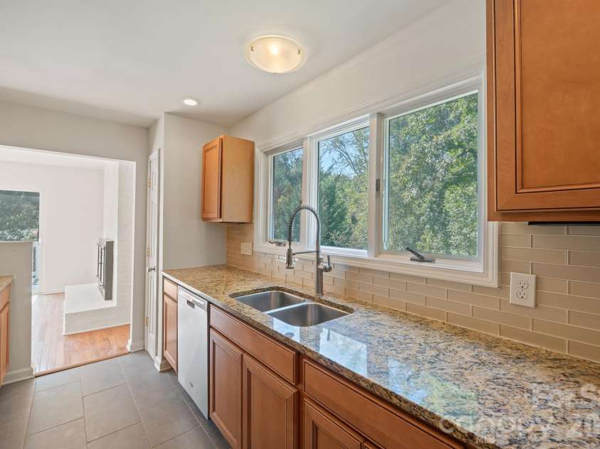 10111 Withers Road, Charlotte, NC 28278.  MLS# CAR4429841, YatesRealty ID 54055. A Peaceful View from the Kitchen Sink