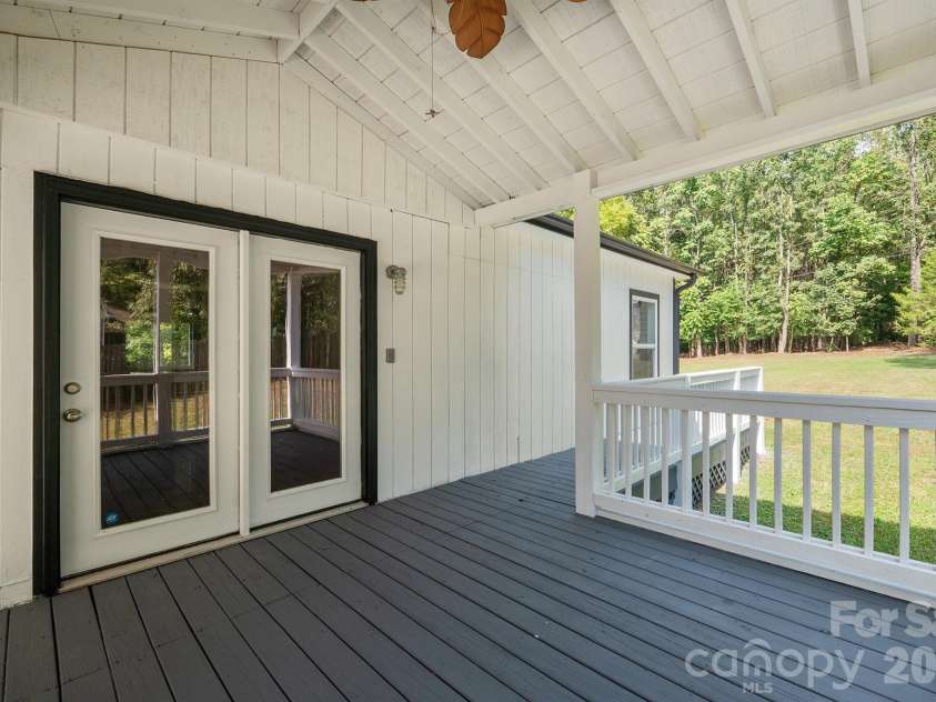 10111 Withers Road, Charlotte, NC 28278.  MLS# CAR4429841, YatesRealty ID 54055. Covered Deck Off Dining Room