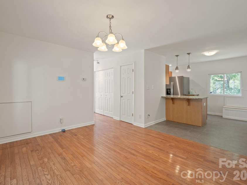 10111 Withers Road, Charlotte, NC 28278.  MLS# CAR4429841, YatesRealty ID 54055. Dining Room into Kitchen