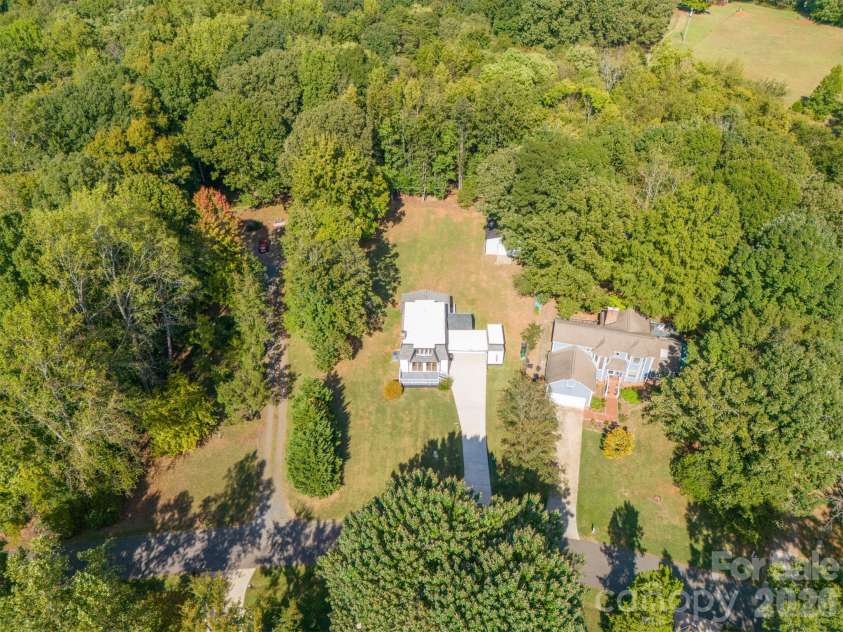 10111 Withers Road, Charlotte, NC 28278.  MLS# CAR4429841, YatesRealty ID 54055. Peacefully Surrounded by Trees