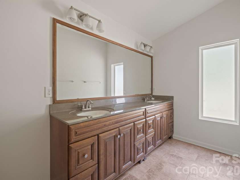 10111 Withers Road, Charlotte, NC 28278.  MLS# CAR4429841, YatesRealty ID 54055. Primary Bath Featuring Dual Sink Vanity
