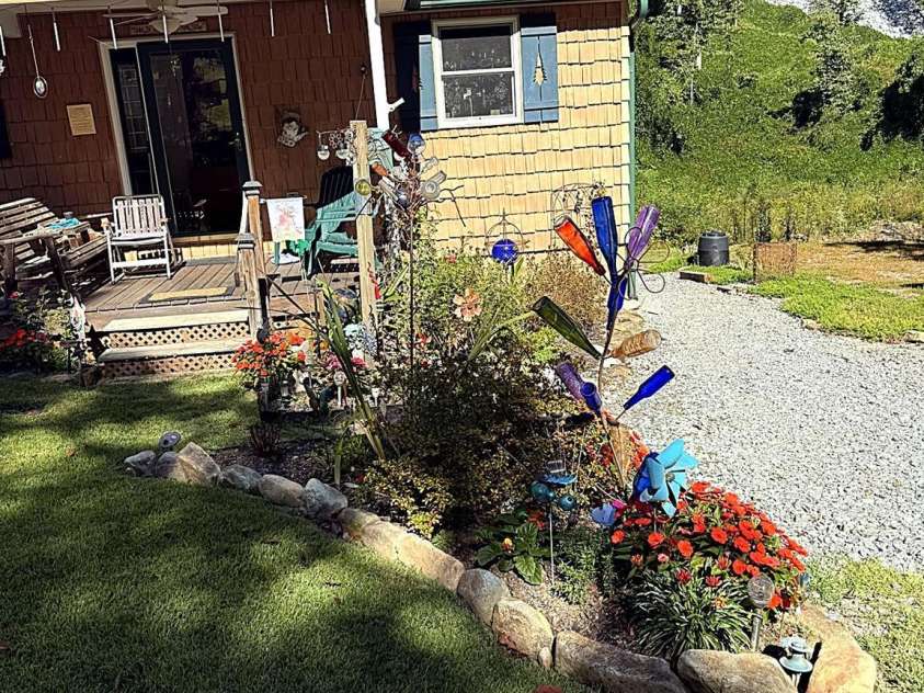 67 Alan Retreat Road, Hendersonville, NC 28792.  MLS# CAR4430107, YatesRealty ID 54061. Driveway side