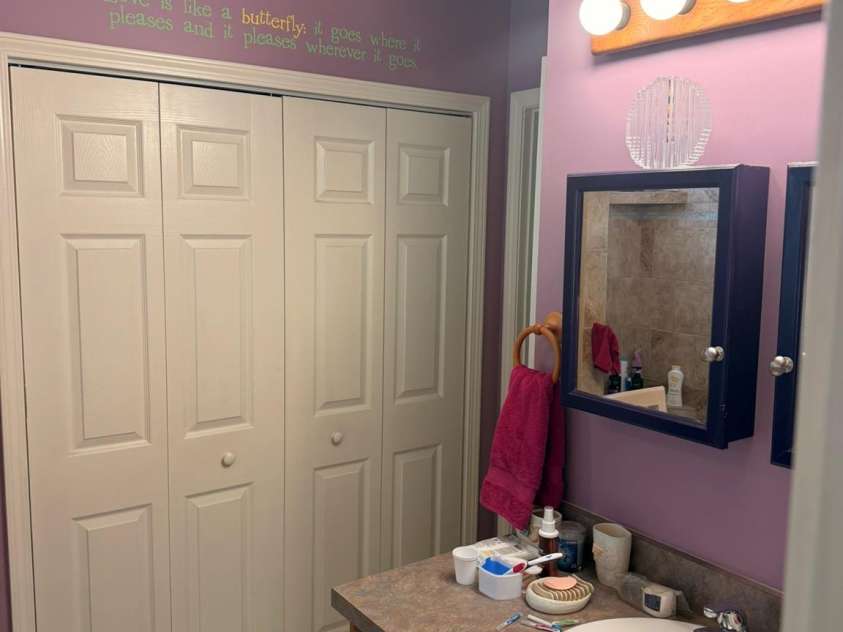 67 Alan Retreat Road, Hendersonville, NC 28792.  MLS# CAR4430107, YatesRealty ID 54061. Main floor bath with laundry closet