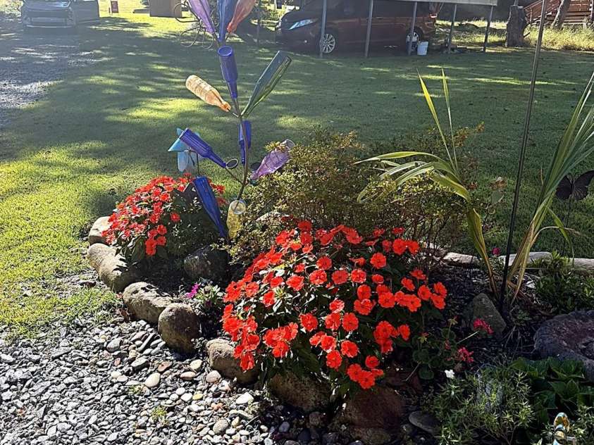 67 Alan Retreat Road, Hendersonville, NC 28792.  MLS# CAR4430107, YatesRealty ID 54061. Manicured landscaping