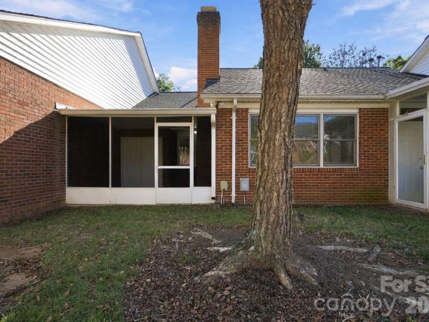 19838 Oak Leaf Circle, Cornelius, NC 28031.  MLS# CAR4429778, YatesRealty ID 54063. Back of the units exterior
