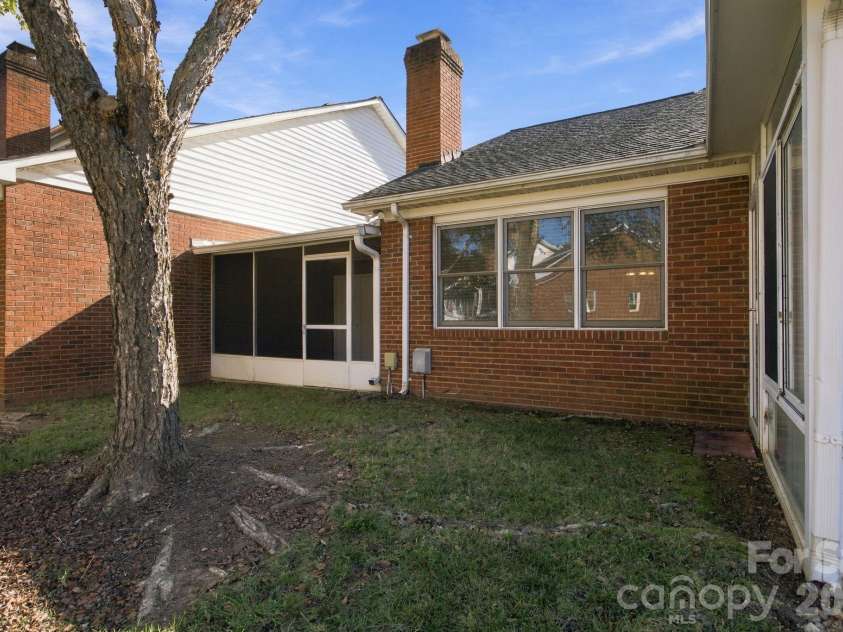 19838 Oak Leaf Circle, Cornelius, NC 28031.  MLS# CAR4429778, YatesRealty ID 54063. Back of the units exterior
