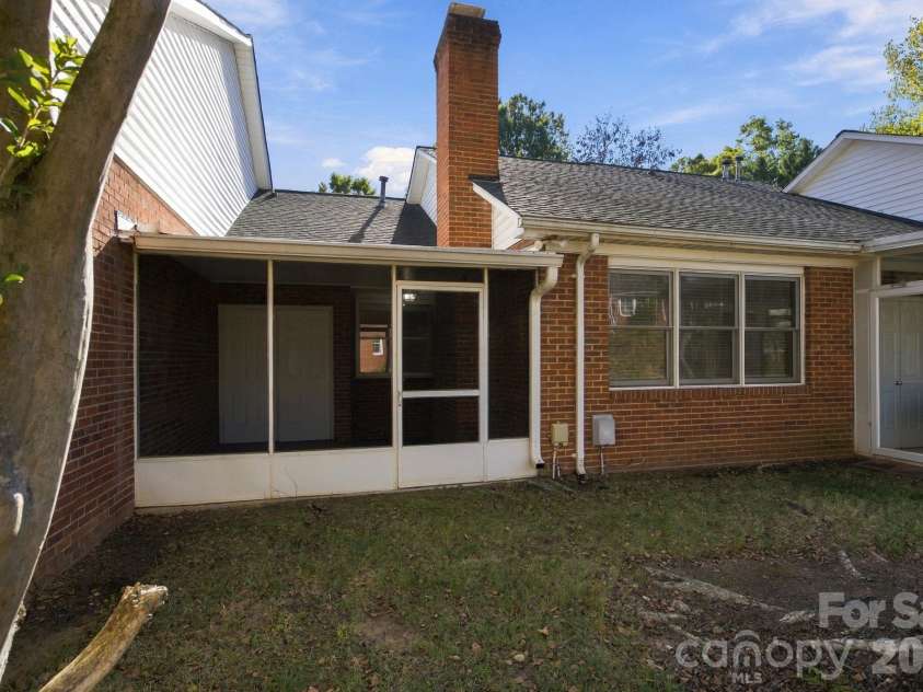 19838 Oak Leaf Circle, Cornelius, NC 28031.  MLS# CAR4429778, YatesRealty ID 54063. Back of the units exterior