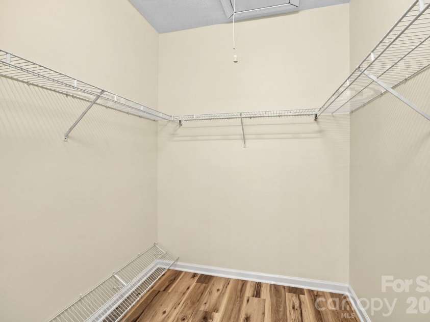 19838 Oak Leaf Circle, Cornelius, NC 28031.  MLS# CAR4429778, YatesRealty ID 54063. Bedroom walk in closet
