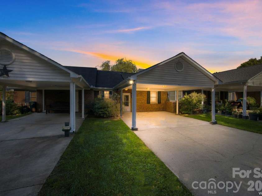 19838 Oak Leaf Circle, Cornelius, NC 28031.  MLS# CAR4429778, YatesRealty ID 54063. Front entry and covered carport