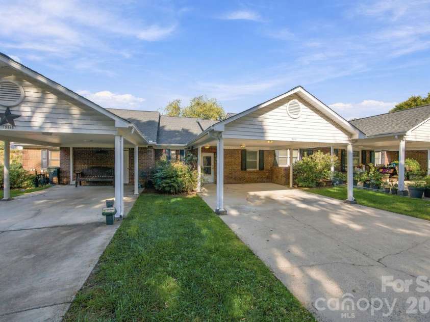 19838 Oak Leaf Circle, Cornelius, NC 28031.  MLS# CAR4429778, YatesRealty ID 54063. Front entry and covered carport