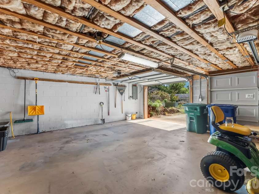 14 Three J Lane, Swannanoa, NC 28778.  MLS# CAR4429550, YatesRealty ID 54070. Basement garage