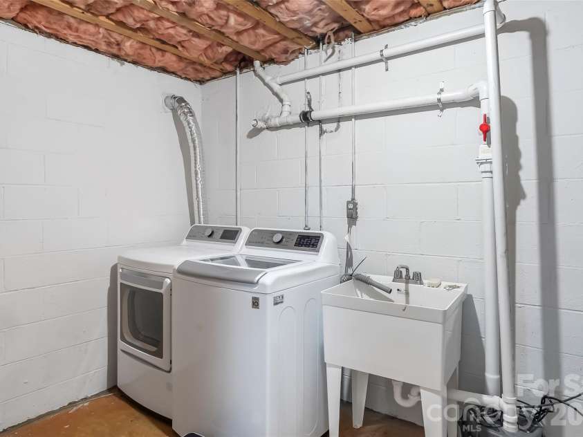 14 Three J Lane, Swannanoa, NC 28778.  MLS# CAR4429550, YatesRealty ID 54070. Laundry area in basement