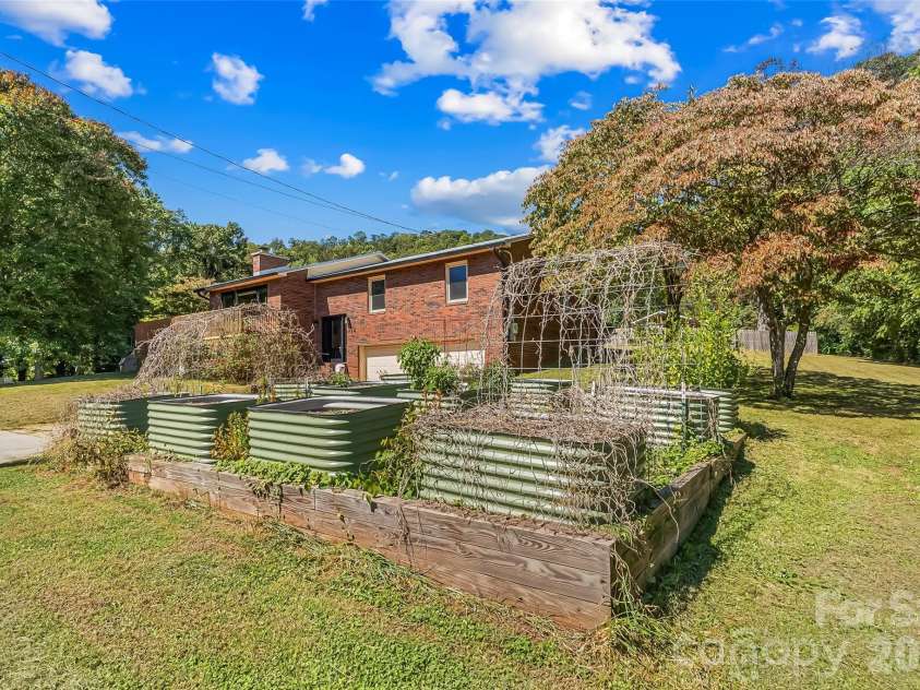 14 Three J Lane, Swannanoa, NC 28778.  MLS# CAR4429550, YatesRealty ID 54070. Raised garden beds