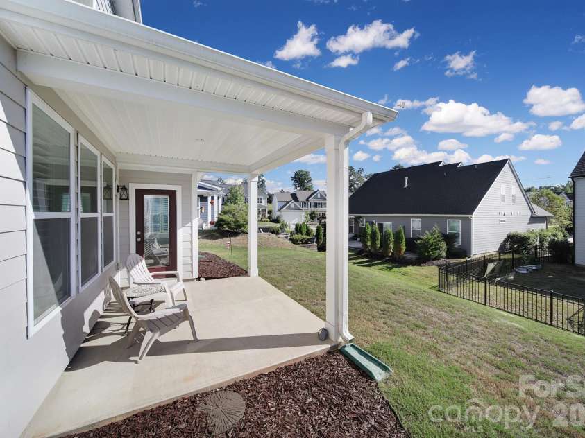 659 Crawfish Drive, Fort Mill, SC 29708.  MLS# CAR4429265, YatesRealty ID 54081. Covered Back Patio