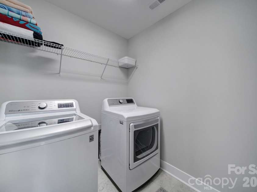 659 Crawfish Drive, Fort Mill, SC 29708.  MLS# CAR4429265, YatesRealty ID 54081. Laundry on Upper