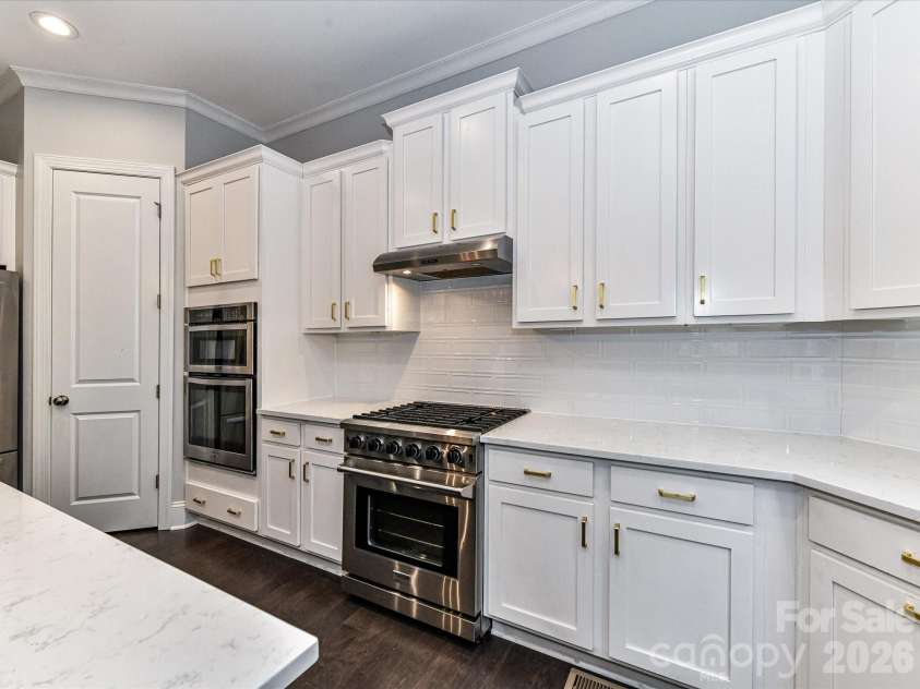 16056 Reynolds Drive, Indian Land, SC 29707.  MLS# CAR4423520, YatesRealty ID 54082. Gas range & Wall Oven