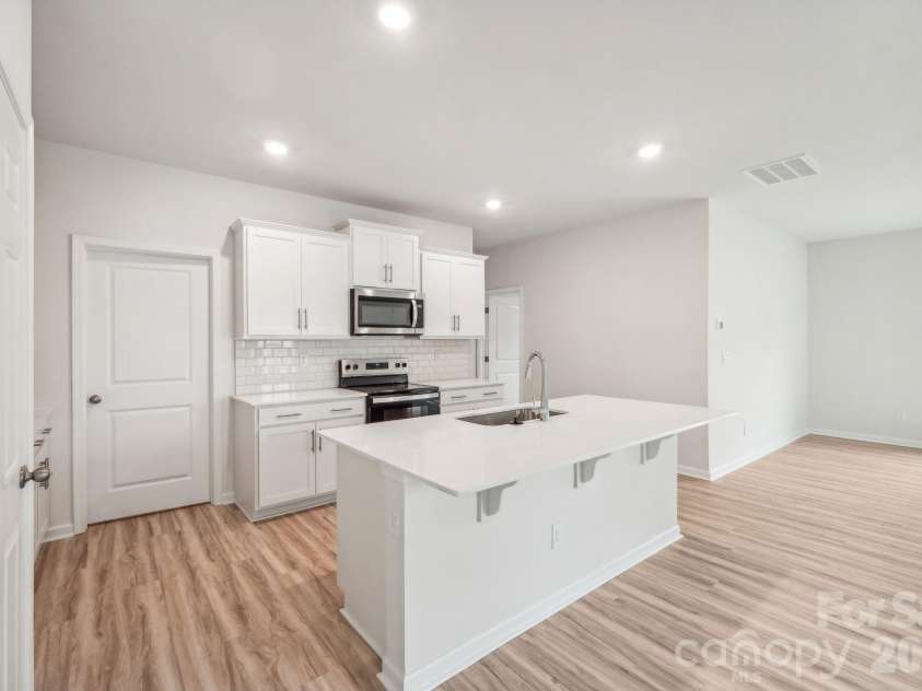 68 Laurel Pointe Drive, Waynesville, NC 28785.  MLS# CAR4430369, YatesRealty ID 54084. Photos are representative