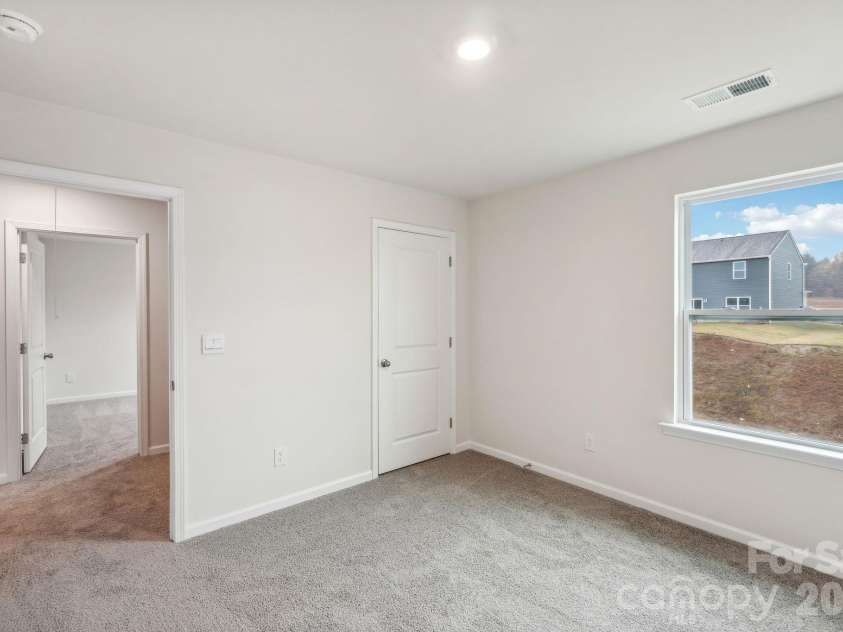 68 Laurel Pointe Drive, Waynesville, NC 28785.  MLS# CAR4430369, YatesRealty ID 54084. Photos are representative