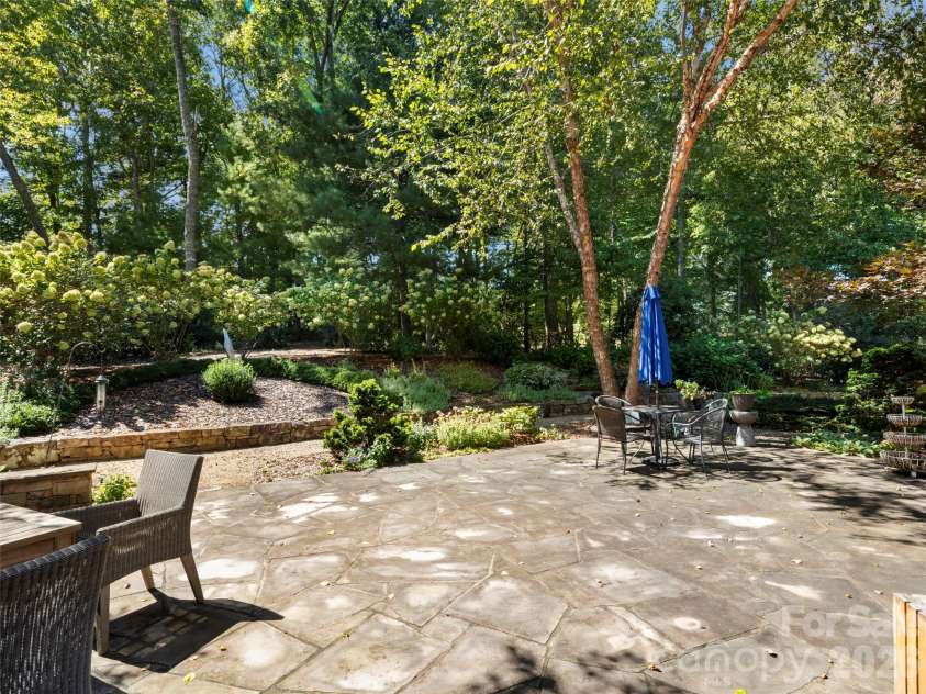 89 Emmas Grove Road, Fletcher, NC 28732.  MLS# CAR4430360, YatesRealty ID 54088. Back Terrace