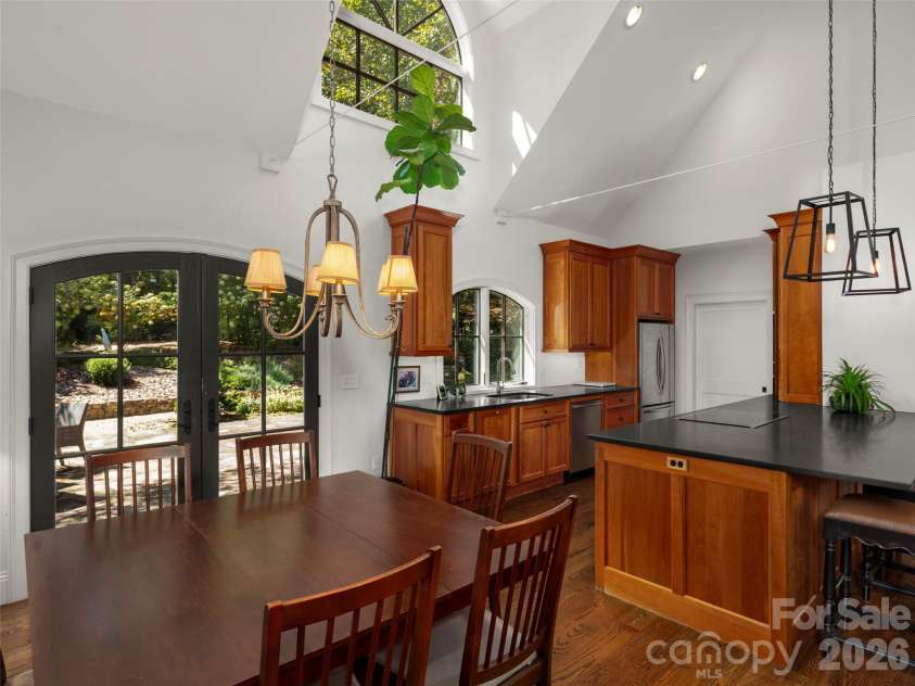 89 Emmas Grove Road, Fletcher, NC 28732.  MLS# CAR4430360, YatesRealty ID 54088. Dining Room and Kitchen
