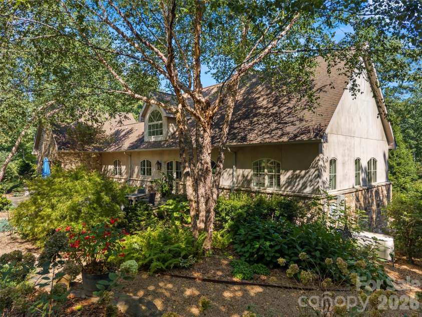 89 Emmas Grove Road, Fletcher, NC 28732.  MLS# CAR4430360, YatesRealty ID 54088. Garden