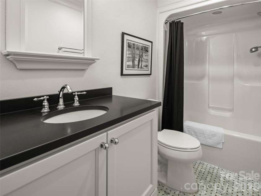 89 Emmas Grove Road, Fletcher, NC 28732.  MLS# CAR4430360, YatesRealty ID 54088. Lower Level Guest Bath 2