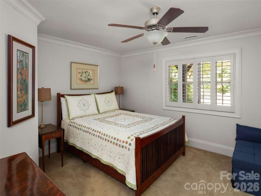 89 Emmas Grove Road, Fletcher, NC 28732.  MLS# CAR4430360, YatesRealty ID 54088. Lower Level Guest Room 1