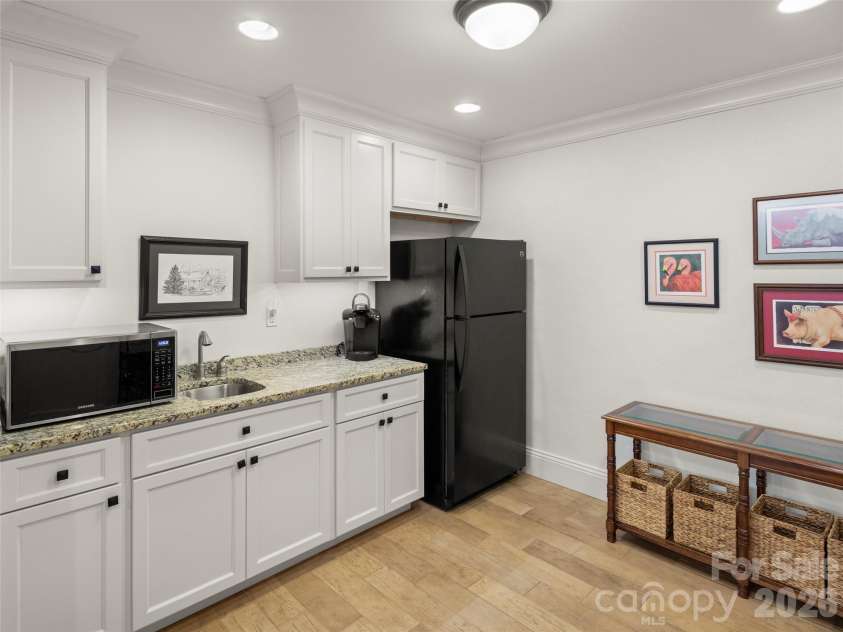89 Emmas Grove Road, Fletcher, NC 28732.  MLS# CAR4430360, YatesRealty ID 54088. Lower Level Kitchenette