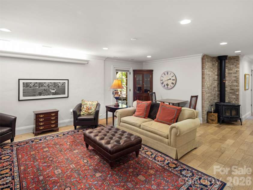 89 Emmas Grove Road, Fletcher, NC 28732.  MLS# CAR4430360, YatesRealty ID 54088. Lower Level Living Area
